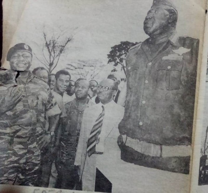 A newspaper clipping of President Idi Amin besides a bust made by Leonard Kateete as a First Year Student in 1973 upon being commissioned by Associated Creative Designers.