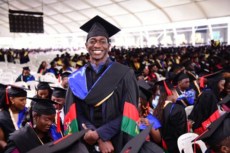 Copy of Kizza Shadrack Yawe beams away on Day 3 of the 74th Graduation Ceremony.