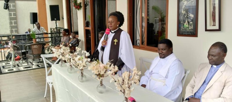 Copy of Rev. Dr. Lydia Nsaale Kitayimbwa speaks at a function. Second from Right is her husband Rev. Prof. John Kitayimbwa.