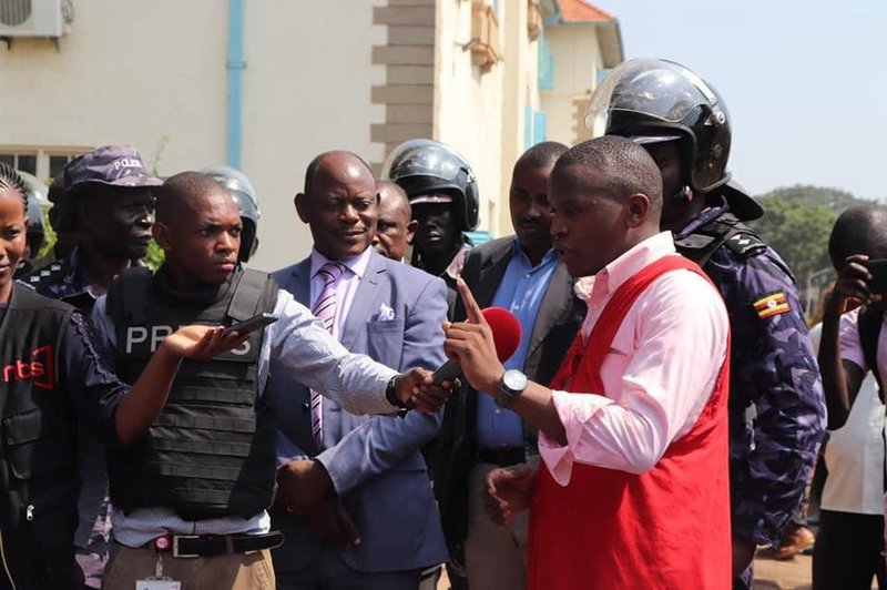 Kateregga addressing students after leading a demostration over reccess term and living out allowances