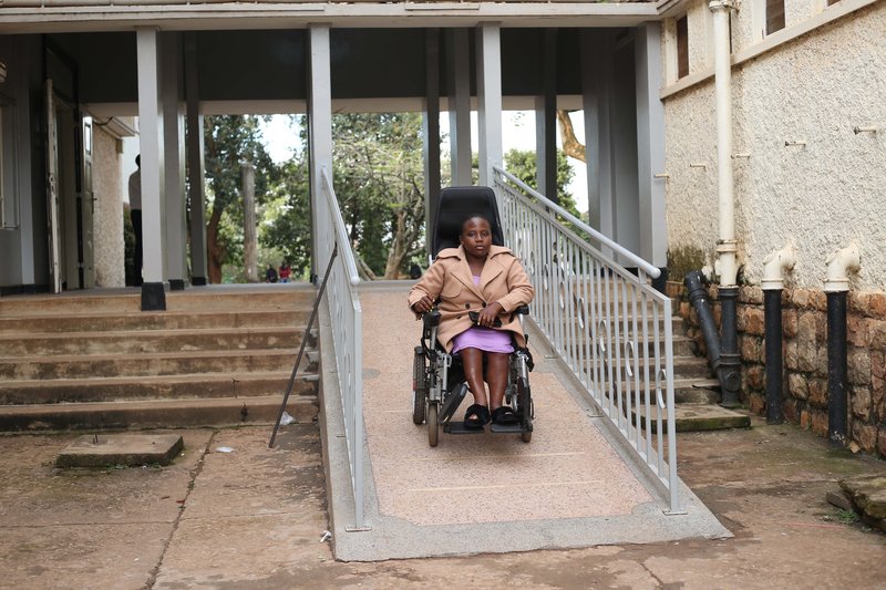 Merab Asiimwe, a third year student of Bachelor of Social Work and Social Administration using ramps at the Faculty of Arts (1)