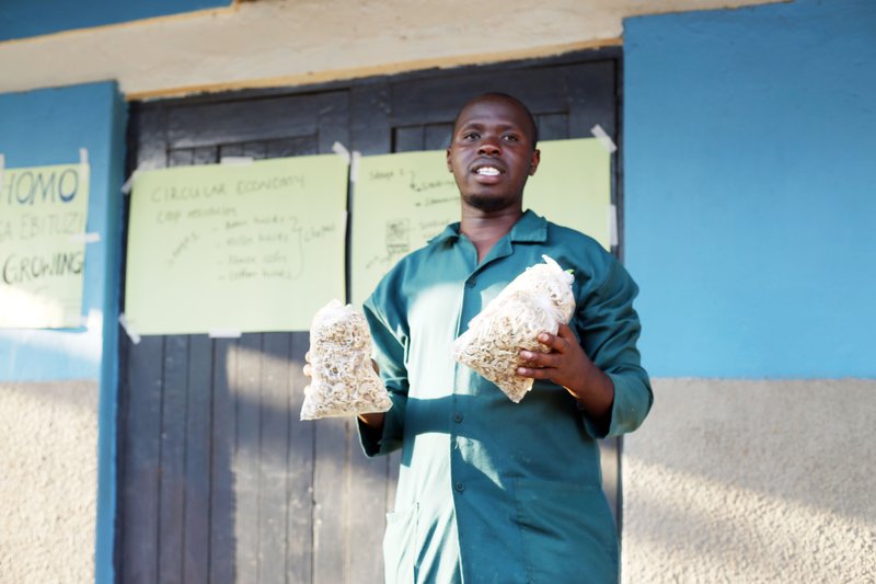 Myres Ndyabawe, (right), with some of the participants in the mushroom growing training on 8th August 2023